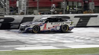 NASCAR Cup Series driver Ross Chastain (1) crosses the finish line and wins the Coca Cola 600 at Charlotte Motor Speedway.