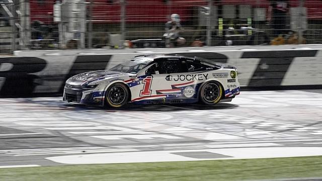 NASCAR Cup Series driver Ross Chastain (1) crosses the finish line and wins the Coca Cola 600 at Charlotte Motor Speedway.