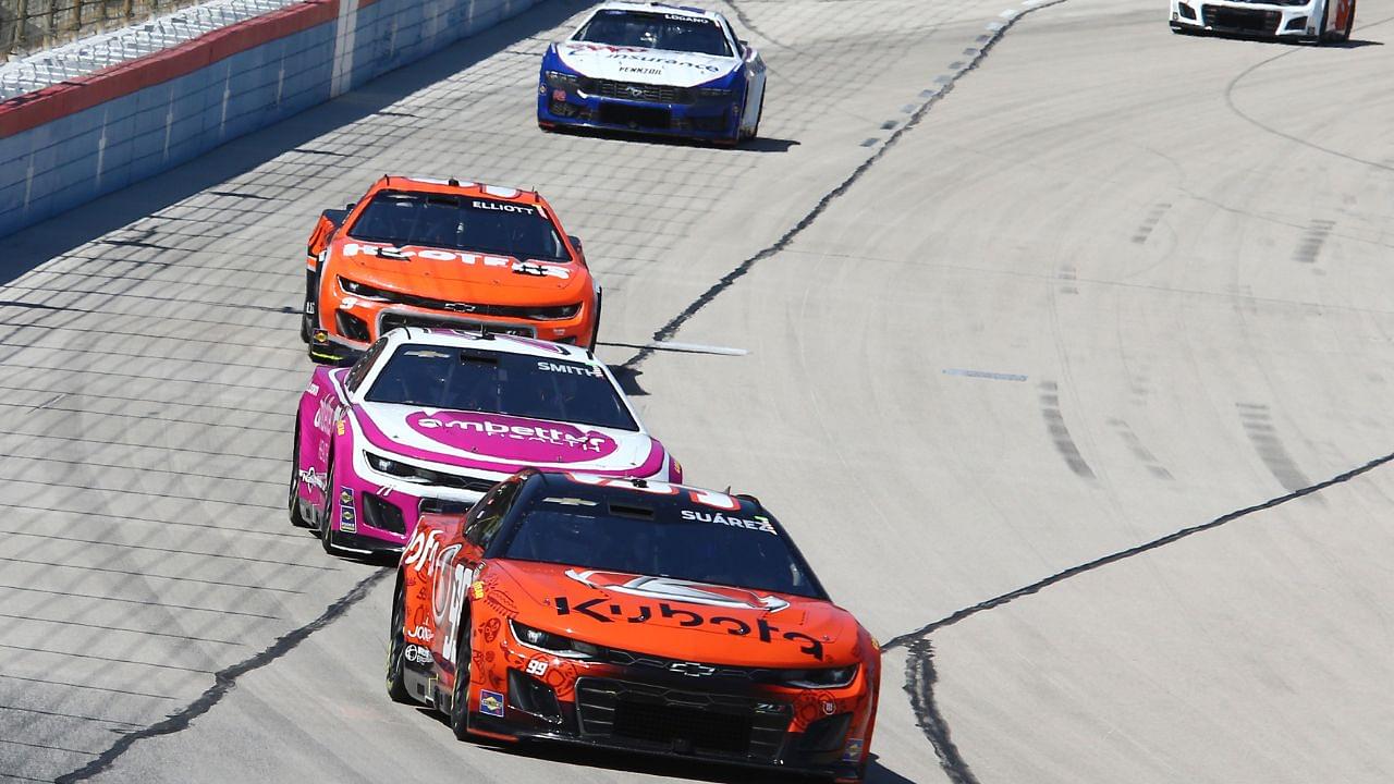 NASCAR Cup Series driver Daniel Suarez (99) leads driver Zane Smith (71) and driver Chase Elliott (9) during the NASCAR Cup Series AutoTrader EchoPark 400 at Texas Motor Speedway.