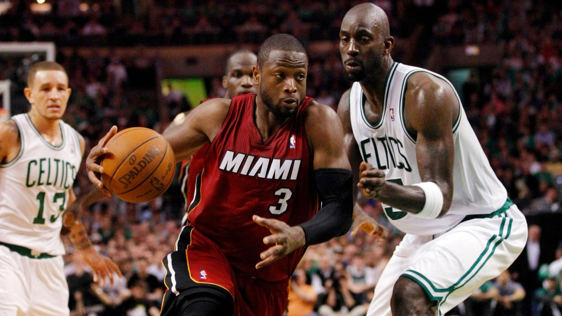 May 7, 2011; Boston, MA, USA; Miami Heat shooting guard Dwyane Wade (3) drives past Boston Celtics power forward Kevin Garnett in game three of the second round of the 2011 NBA playoffs at TD Garden.