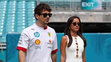 Charles Leclerc Scuderia Ferrari HP with girlfriend Alexandra Saint Mleux and dachshund in the paddock, Grand Prix of Miami