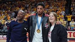 Former Iowa State and Indiana Packer guard Tyrese Haliburton holds his parents John and Brenda Haliburton as the unveiling his Olympic 24 gold made banner during the halftime of Cyclones and Wildcats men’s basketball showdown at Hilton Coliseum on Saturday March 1, 2025 in Ames, Iowa.