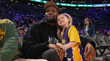 Kevin Durant with a young Valkyries fan.