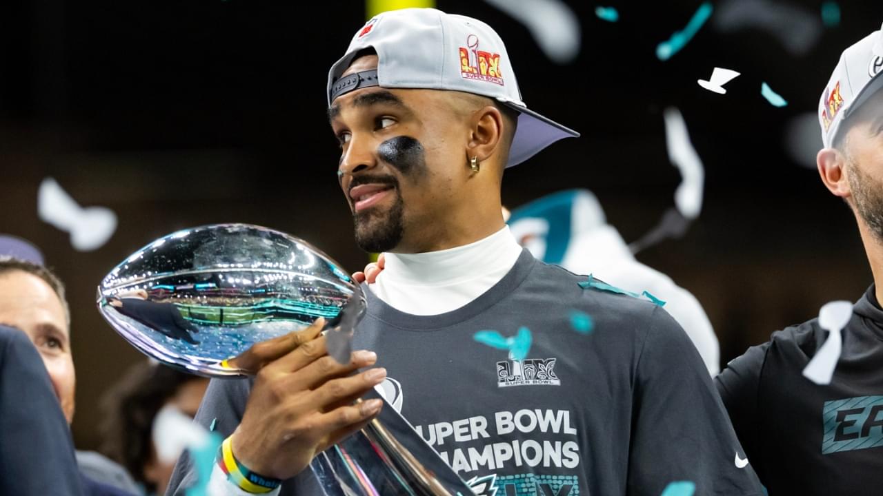 Feb 9, 2025; New Orleans, LA, USA; Philadelphia Eagles quarterback Jalen Hurts (left) and head coach Nick Sirianni celebrate with the Vince Lombardi Trophy after defeating the Kansas City Chiefs during Super Bowl LIX at Ceasars Superdome.