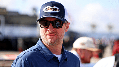 Feb 12, 2025; Daytona Beach, Florida, USA; NASCAR team owner Dale Earnhardt Jr. looks on during practice for the Daytona 500 at Daytona International Speedway. Mandatory Credit: Peter Casey-Imagn Images