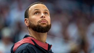 Golden State Warriors guard Stephen Curry (30) looks on from the bench against the Minnesota Timberwolves in the second half during game two of the second round for the 2025 NBA Playoffs at Target Center.