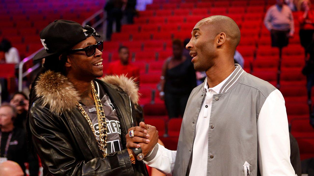 Feb 16, 2013; Houston, TX, USA; Recording artist 2 Chainz (left) greets Los Angeles Lakers player Kobe Bryant after the 2013 NBA all star slam dunk contest at the Toyota Center. Mandatory Credit: Brett Davis-Imagn Images