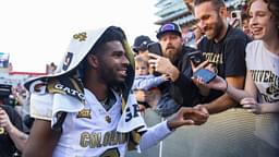 Colorado Buffalos quarterback Shedeur Sanders (2) greets fans after defeating the Arizona Wildcats at Arizona Stadium.