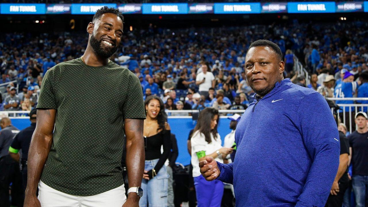 Detroit Lions legend Calvin Johnson talks to Barry Sanders before kickoff against Seattle Seahawks at Ford Field in Detroit on Sunday, Sept. 17, 2023.