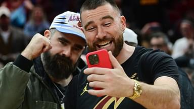 Mar 5, 2024; Cleveland, Ohio, USA; Cleveland natives and NFL players Travis, right, and Jason Kelce celebrate after the Cleveland Cavaliers beat the Boston Celtics during the second half at Rocket Mortgage FieldHouse.