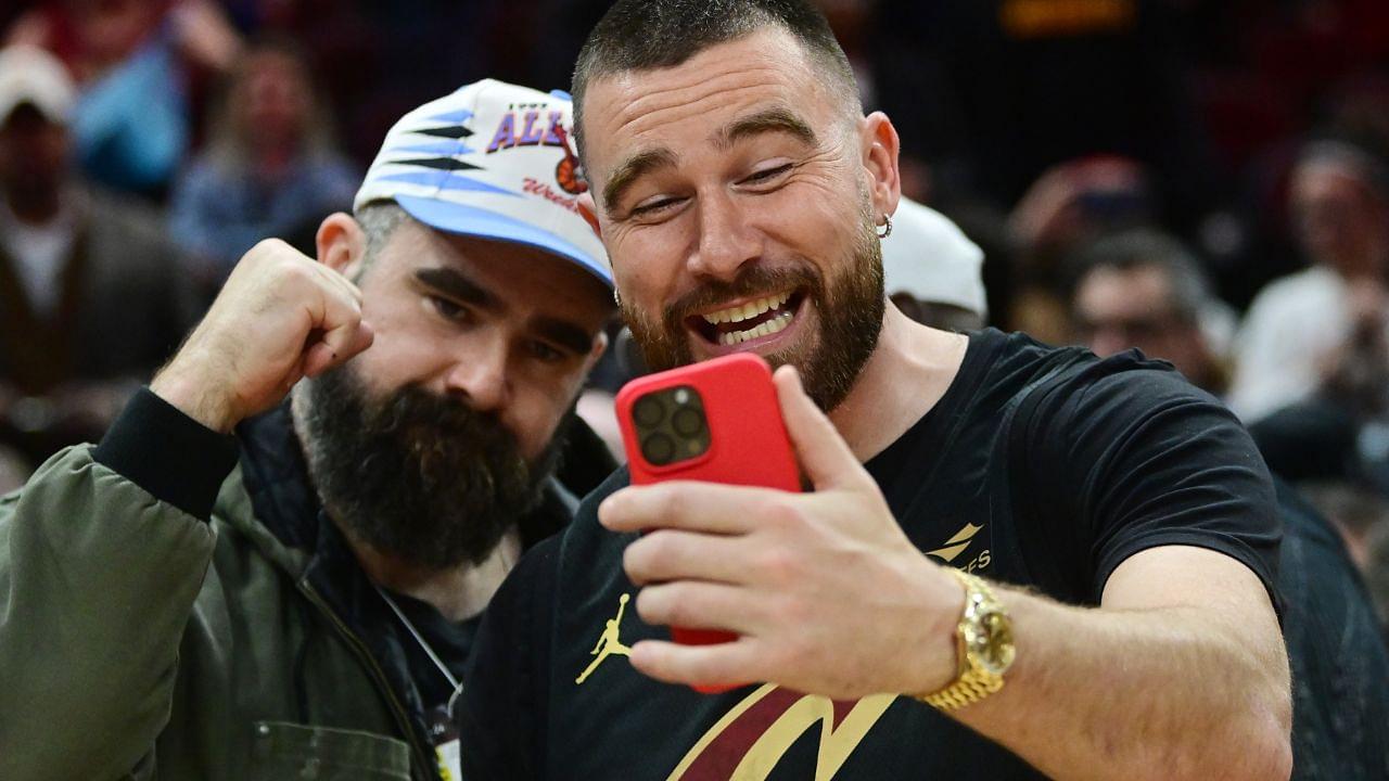 Mar 5, 2024; Cleveland, Ohio, USA; Cleveland natives and NFL players Travis, right, and Jason Kelce celebrate after the Cleveland Cavaliers beat the Boston Celtics during the second half at Rocket Mortgage FieldHouse.