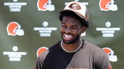 Cleveland Browns quarterback Shedeur Sanders (12) jokes about his signing bonus during a press conference before day two of NFL rookie minicamp at the Cleveland Browns training facility on Saturday, May 10, 2025, in Berea, Ohio.