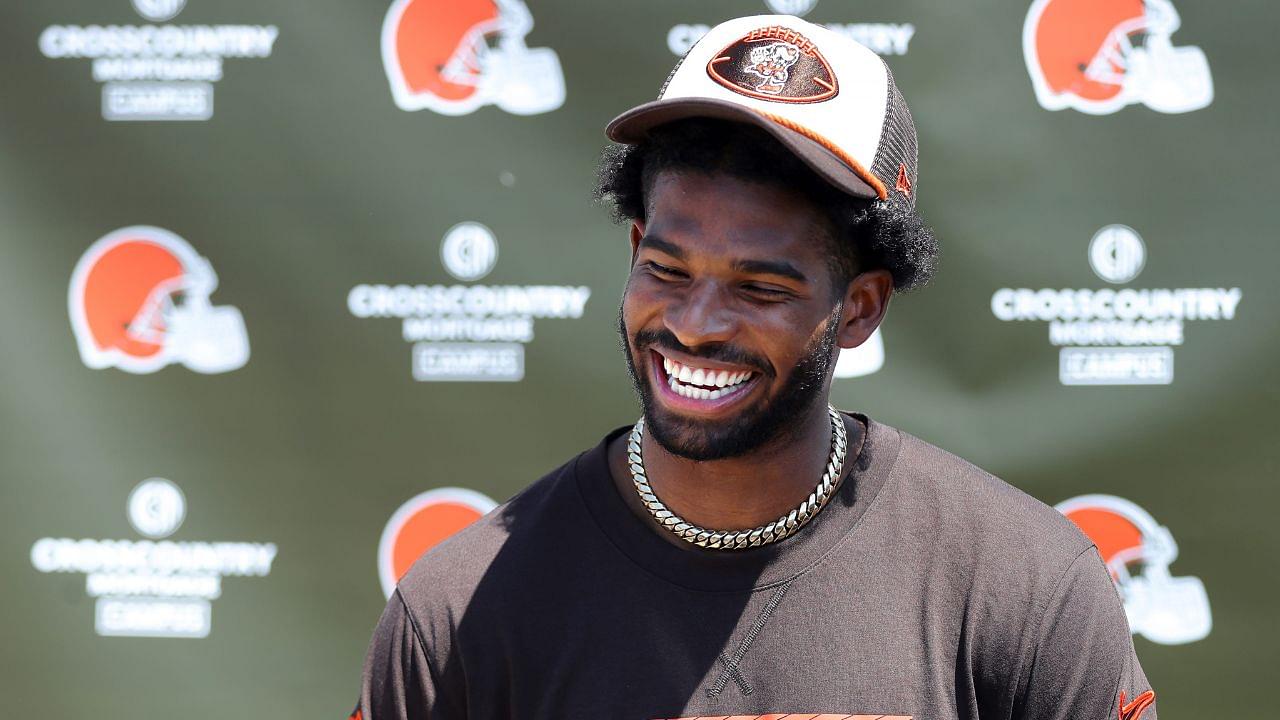 Cleveland Browns quarterback Shedeur Sanders (12) jokes about his signing bonus during a press conference before day two of NFL rookie minicamp at the Cleveland Browns training facility on Saturday, May 10, 2025, in Berea, Ohio.