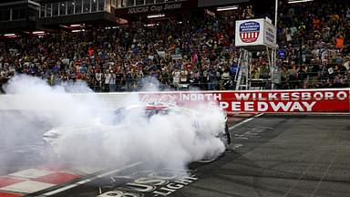 North Wilkesboro, North Carolina, USA; NASCAR Cup Series driver Christopher Bell (20) celebrates winning the NASCAR All-Star Race at North Wilkesboro Speedway.
