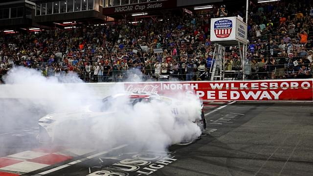 North Wilkesboro, North Carolina, USA; NASCAR Cup Series driver Christopher Bell (20) celebrates winning the NASCAR All-Star Race at North Wilkesboro Speedway.