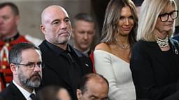 US media personality Joe Rogan stands for a benediction after President Donald Trump was sworn in as the 47th US President in the US Capitol Rotunda in Washington