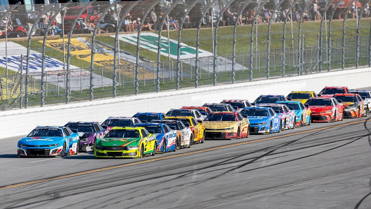 NASCAR Cup Series drivers William Byron (24) and Austin Cindric (2) battle for the lead late during stage three of the NASCAR: Jack Link's 500 at Talladega Superspeedway.