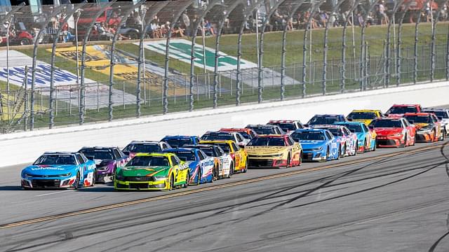 NASCAR Cup Series drivers William Byron (24) and Austin Cindric (2) battle for the lead late during stage three of the NASCAR: Jack Link's 500 at Talladega Superspeedway.