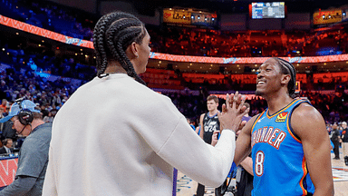 Oklahoma City Thunder forward Jalen Williams (8) meets with his brother Utah Jazz forward Cody Williams (5) after their game