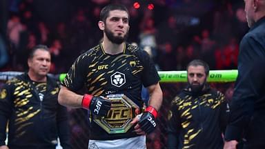 Islam Makhachev (red gloves) reacts after defeating Renato Moicano (not pictured) in a lightweight title fight during UFC 311 at Intuit Dome.