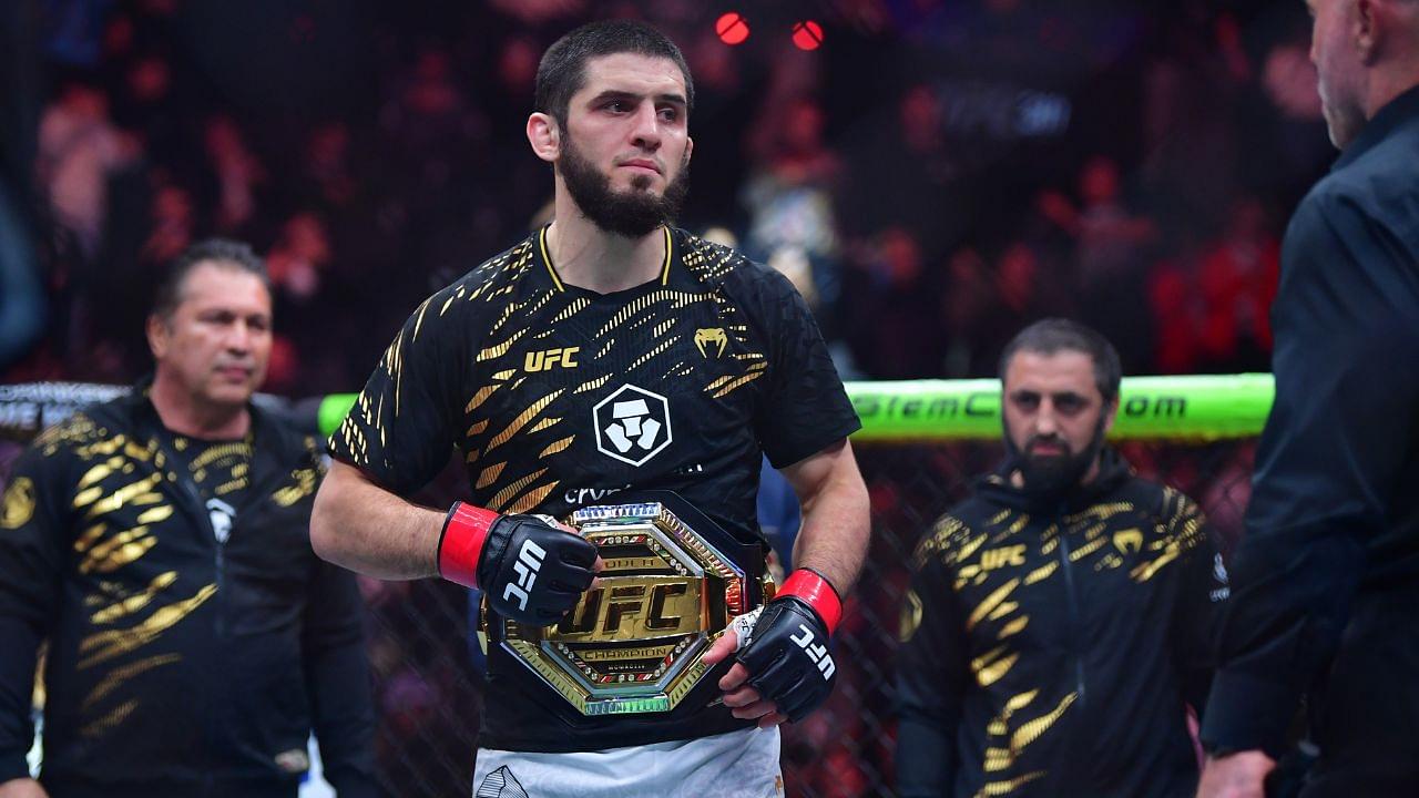 Islam Makhachev (red gloves) reacts after defeating Renato Moicano (not pictured) in a lightweight title fight during UFC 311 at Intuit Dome.
