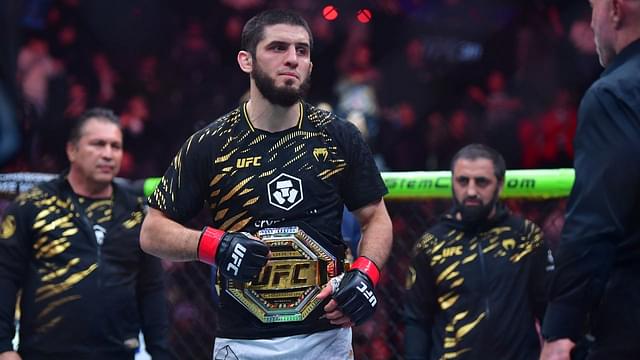 Islam Makhachev (red gloves) reacts after defeating Renato Moicano (not pictured) in a lightweight title fight during UFC 311 at Intuit Dome.