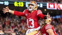 December 30, 2024; Santa Clara, California, USA; San Francisco 49ers quarterback Brock Purdy (13) celebrates with tight end George Kittle (85) after scoring a touchdown against the Detroit Lions during the second quarter at Levi's Stadium.