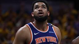 May 27, 2025; Indianapolis, Indiana, USA; New York Knicks center Karl-Anthony Towns (32) looks up at a scoreboard during the third quarter against the Indiana Pacers of game four of the eastern conference finals for the 2025 NBA Playoffs at Gainbridge Fieldhouse