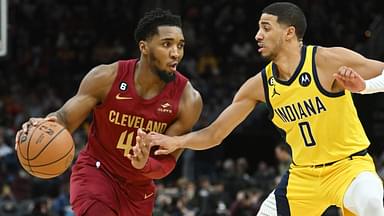 Indiana Pacers guard Tyrese Haliburton (0) defends against Cleveland Cavaliers guard Donovan Mitchell (45) during the second half at Rocket Mortgage FieldHouse.