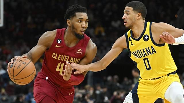 Indiana Pacers guard Tyrese Haliburton (0) defends against Cleveland Cavaliers guard Donovan Mitchell (45) during the second half at Rocket Mortgage FieldHouse.