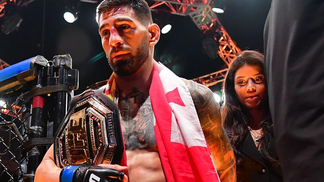 ; Ilia Topuria celebrates his championship victory against Alexander Volkanovski during UFC 298 at Honda Center.