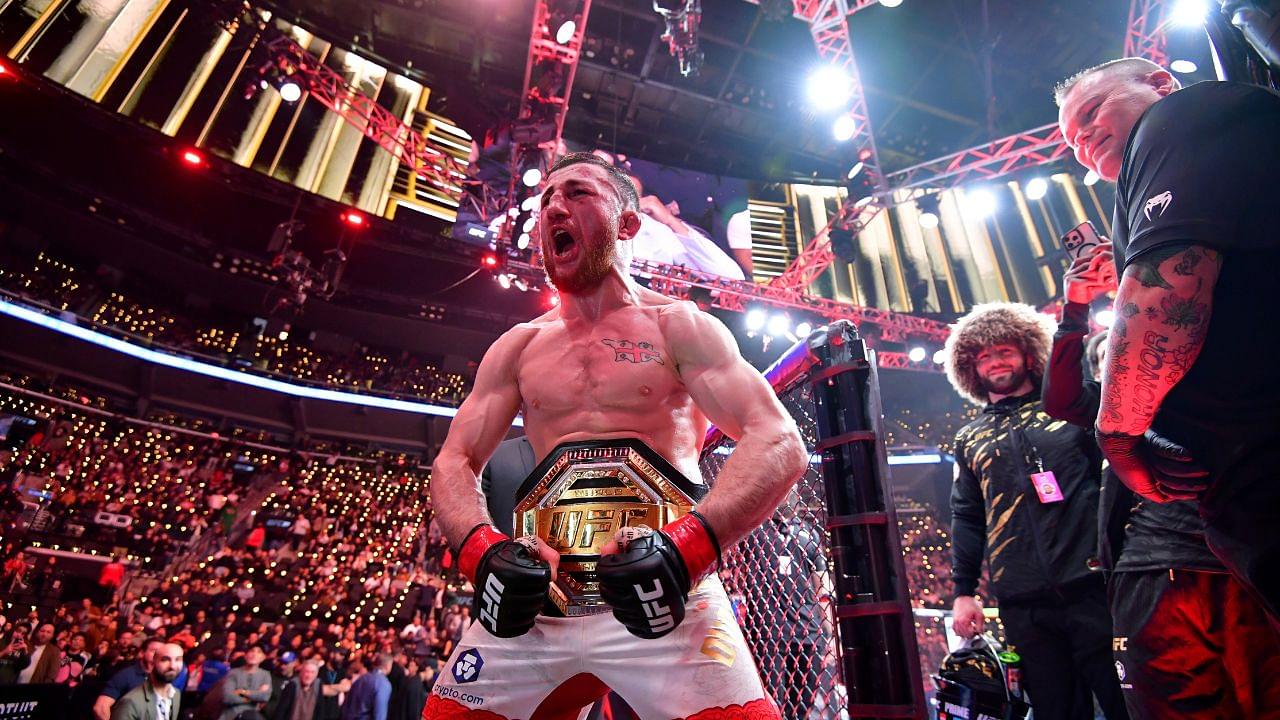 Merab Dvalishvili (red gloves) celebrates after winning a UFC bantamweight title fight against Umar Nurmagomedov (not pictured) during UFC 311 at Intuit Dome.