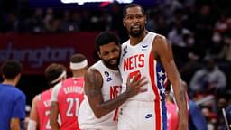 Brooklyn Nets guard Kyrie Irving (11) celebrates with Nets forward Kevin Durant (7) against the Washington Wizards in the fourth quarter at Capital One Arena.