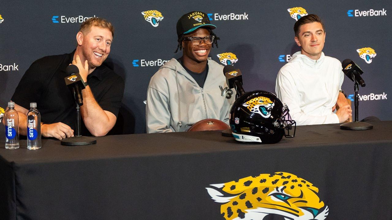 Jacksonville Jaguars ead Coach Liam Coen, left, has a laugh with Jacksonville Jaguars’ first-round pick, Colorado Buffaloes wide receiver and defensive back Travis Hunter, center, during a press conference Friday, March 25, 2025 at Miller Electric Center in Jacksonville, Fla. with General Manager James Gladstone, right