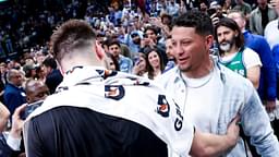 Los Angeles Lakers guard Luka Doncic (77) hugs Kansas City Chiefs quarterback Patrick Mahomes after the game against the Dallas Mavericks at American Airlines Center.