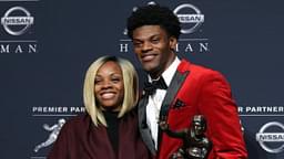 Louisville quarterback Lamar Jackson and his mother Felicia Jones pose with the trophy during a press conference at the New York Marriott Marquis after winning the 2016 Heisman Trophy award during a presentation at the Playstation Theater.