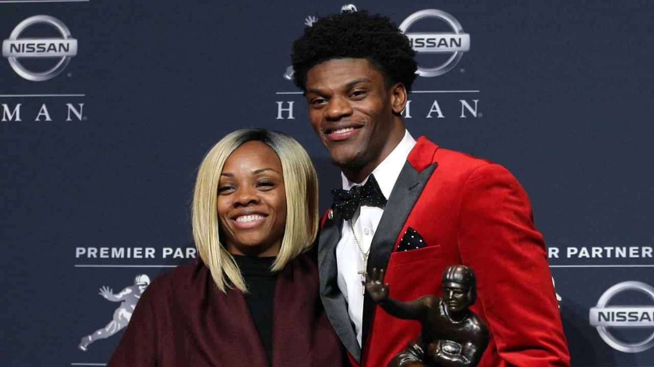 Louisville quarterback Lamar Jackson and his mother Felicia Jones pose with the trophy during a press conference at the New York Marriott Marquis after winning the 2016 Heisman Trophy award during a presentation at the Playstation Theater.