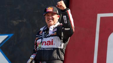 NHRA top fuel driver Tony Stewart celebrates after winning the Route 66 Nationals at Route 66 Raceway.