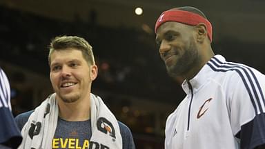 Cleveland Cavaliers forward LeBron James (right) reacts with forward Mike Miller (18) during a timeout against the Milwaukee Bucks at Quicken Loans Arena. Cleveland won 106-100.