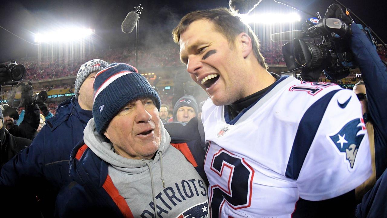 New England Patriots head coach Bill Belichick and quarterback Tom Brady (12) celebrate the win over the Kansas City Chiefs during overtime in the AFC Championship game at Arrowhead Stadium.