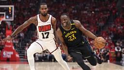 Golden State Warriors forward Draymond Green (23) drives with the ball past Houston Rockets forward Tari Eason (17) to score a basket during the second quarter of game seven of first round for the 2025 NBA Playoffs at Toyota Center
