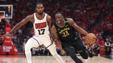Golden State Warriors forward Draymond Green (23) drives with the ball past Houston Rockets forward Tari Eason (17) to score a basket during the second quarter of game seven of first round for the 2025 NBA Playoffs at Toyota Center