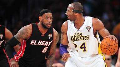 Los Angeles Lakers shooting guard Kobe Bryant (24) controls the ball against the defense of Miami Heat small forward LeBron James (6) during the first half at Staples Center
