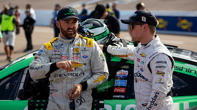 Nov 4, 2022; Avondale, Arizona, USA; NASCAR Cup Series driver Austin Dillon (left) talks with teammate Tyler Reddick during qualifying for the NASCAR championship race at Phoenix Raceway. Mandatory Credit: Mark J. Rebilas-Imagn Images
