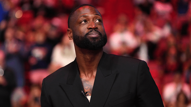 Former Miami Heat player Dwyane Wade reacts after learning a statue will be erected outside of Kaseya Center in 2025