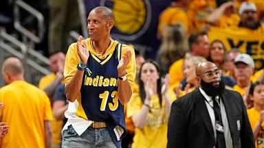 Jun 11, 2025; Indianapolis, Indiana, USA; Former Indiana Pacers player Reggie Miller celebrates during the third quarter of the game between the Indiana Pacers and the Oklahoma City Thunder in game three of the 2025 NBA Finals at Gainbridge Fieldhouse.