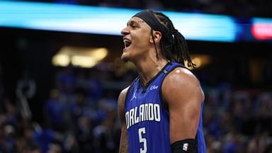 Apr 15, 2025; Orlando, Florida, USA; Orlando Magic forward Paolo Banchero (5) reacts after a play against the Atlanta Hawks in the fourth quarter at Kia Center