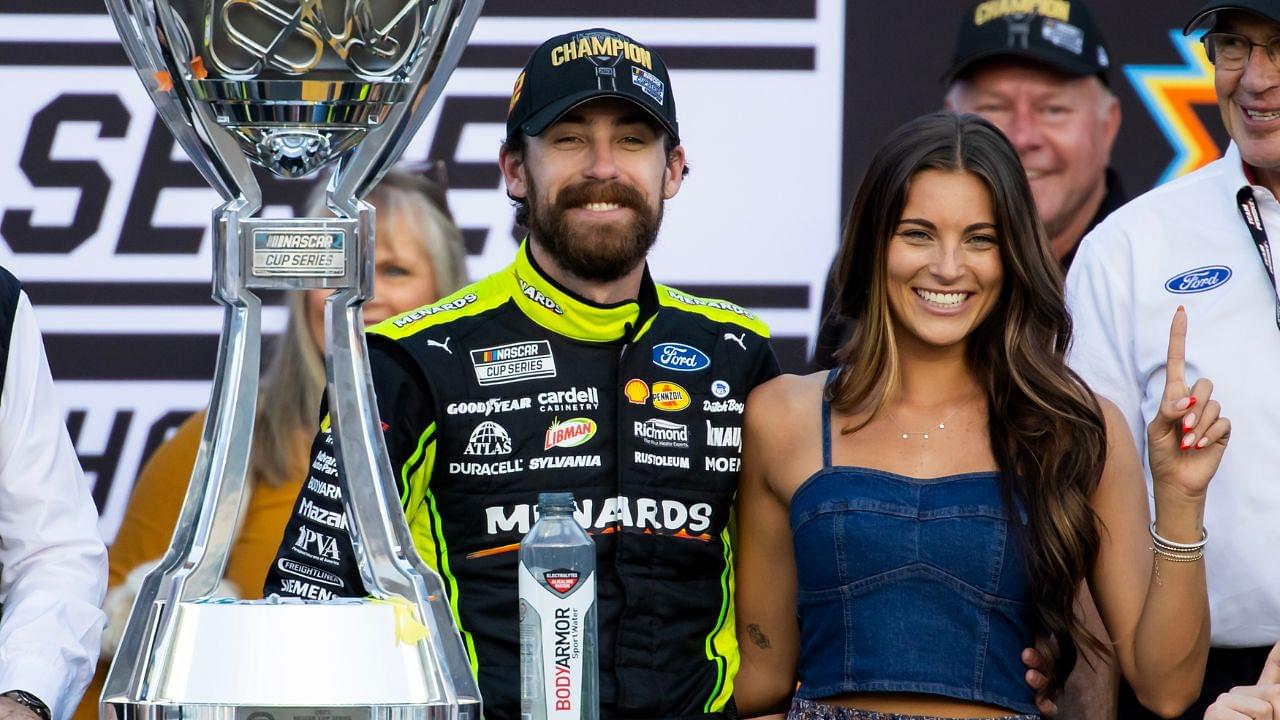 NASCAR Cup Series driver Ryan Blaney (12) celebrates with girlfriend Gianna Tulio after winning the 2023 NASCAR Cup Series Championship at Phoenix Raceway.