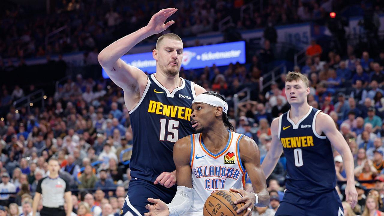 Mar 10, 2025; Oklahoma City, Oklahoma, USA; Denver Nuggets center Nikola Jokic (15) defends a drive by Oklahoma City Thunder guard Shai Gilgeous-Alexander (2) during the second half at Paycom Center. Mandatory Credit: Alonzo Adams-Imagn Images