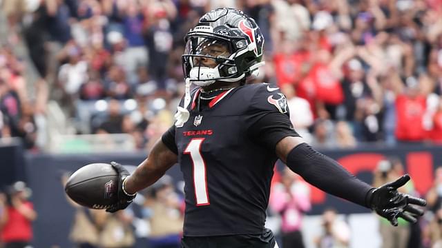 Houston Texans wide receiver Stefon Diggs (1) scores against the Jacksonville Jaguars in the first quarter at NRG Stadium.